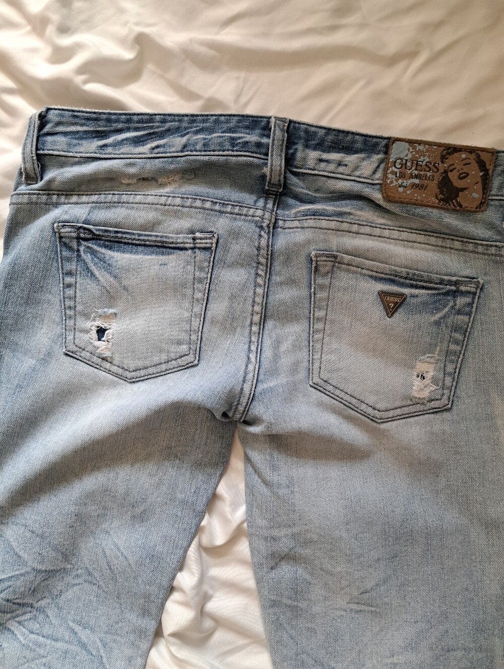 GUESS Light Blue Skinny Jeans with Distressed Back Pockets
